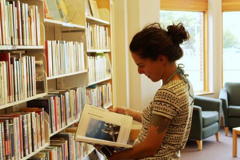 Woman Browsing New Books